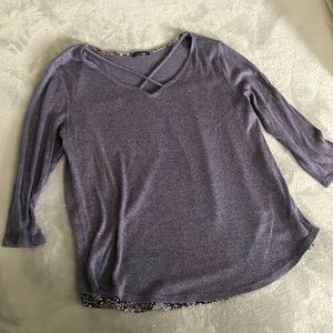 Soft sweater blouse, patterned detail and different fabric in back. 3/4 sleeve